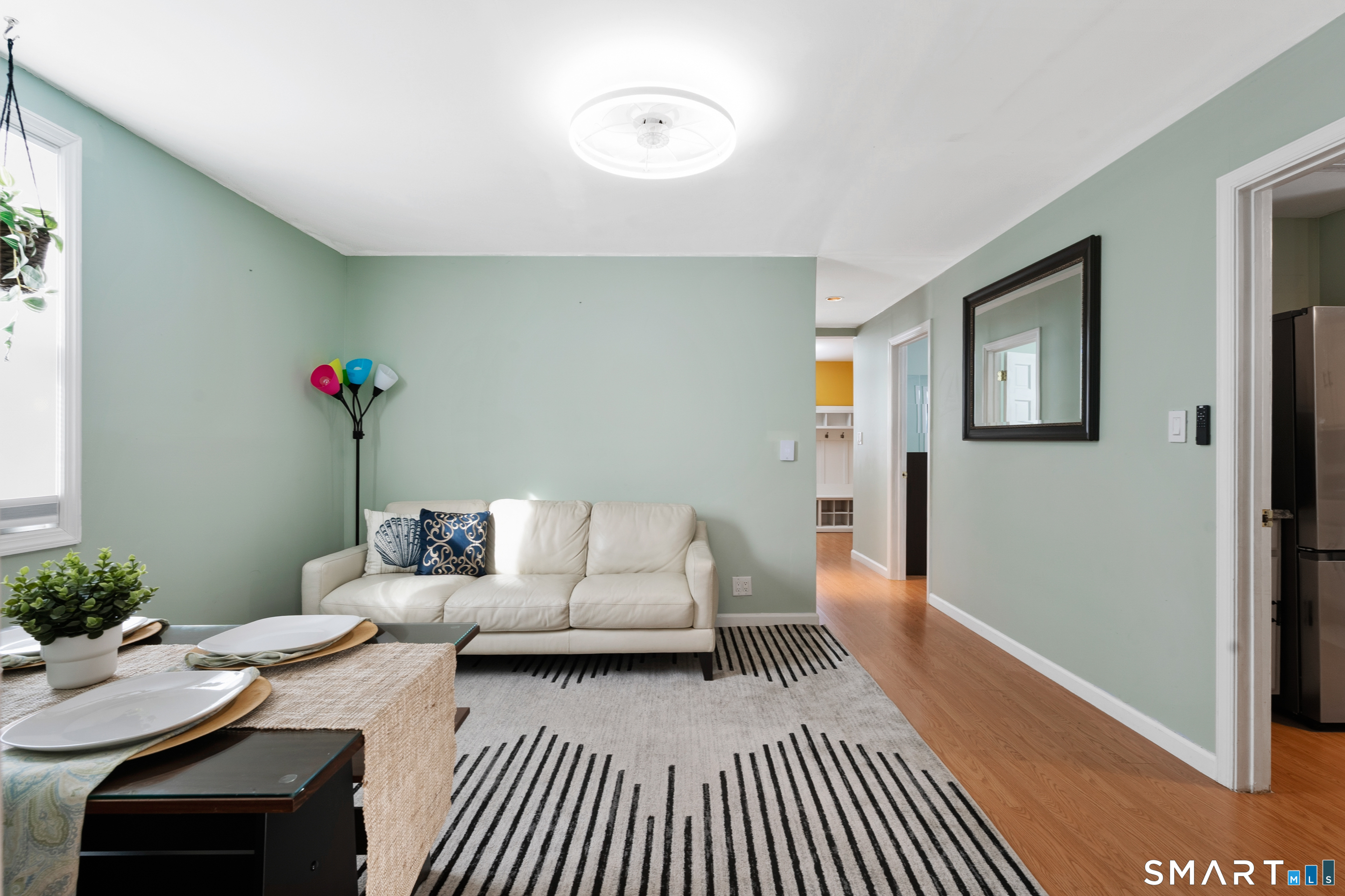 14 Bantam Road New Fairfield, CT 06812 - Photo 10 of 42 a living room with furniture and a wooden floor