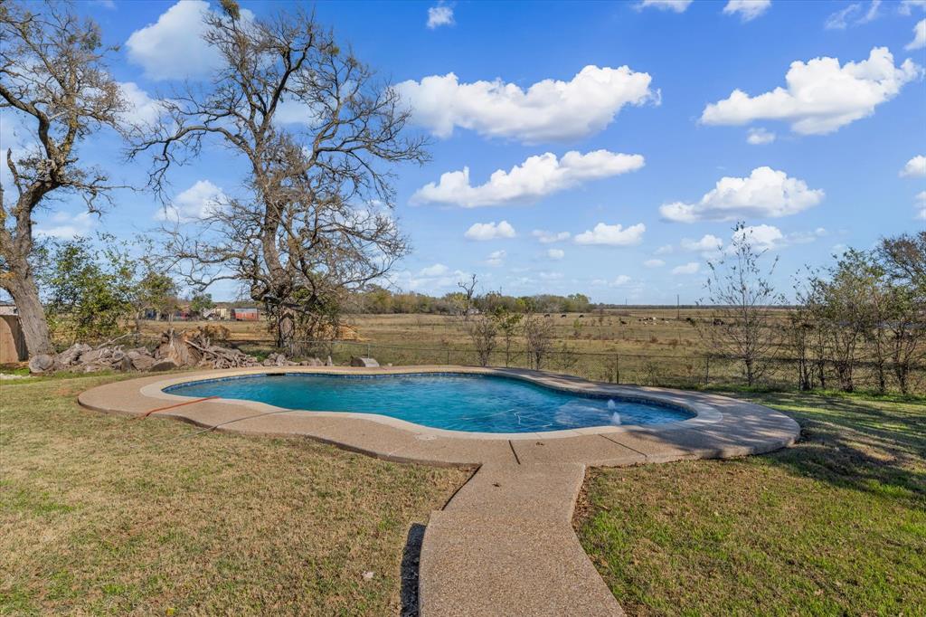 7633 South 3rd St Road Waco, TX 76706 - Photo 5 of 33 a view of a lake with a yard