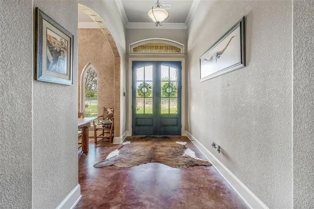 a view of entryway with a front door