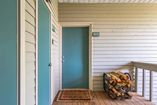 a kitchen with stainless steel appliances granite countertop a refrigerator and a stove