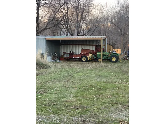 a view of outdoor space with deck and yard