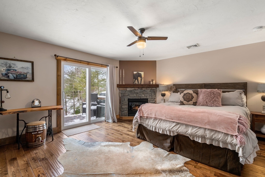 43 Ridge Way Sturbridge, MA 01566 - Photo 15 of 22 a bedroom with a bed and a large window