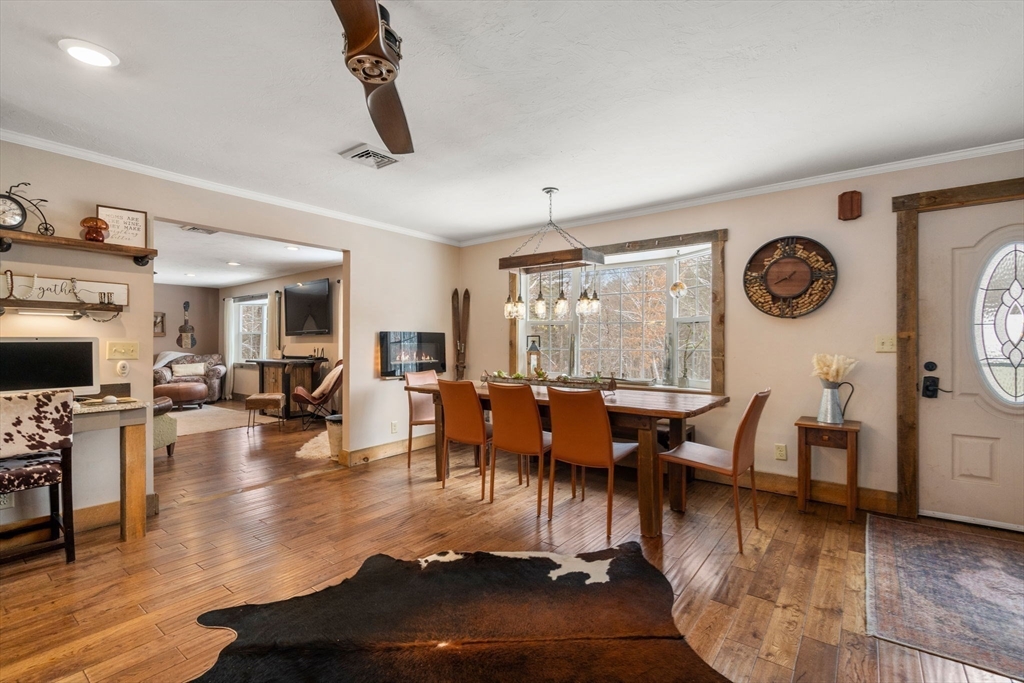 43 Ridge Way Sturbridge, MA 01566 - Photo 7 of 22 a view of a dining room with furniture window and wooden floor