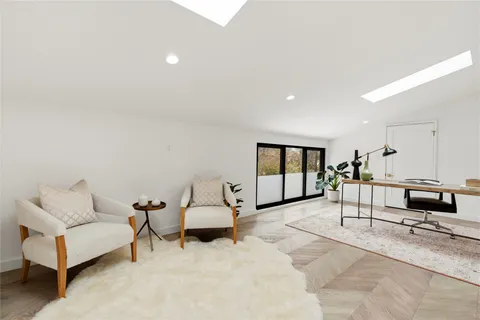 a view of outdoor space with wooden floor