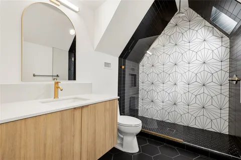 a view of front door with wooden floor