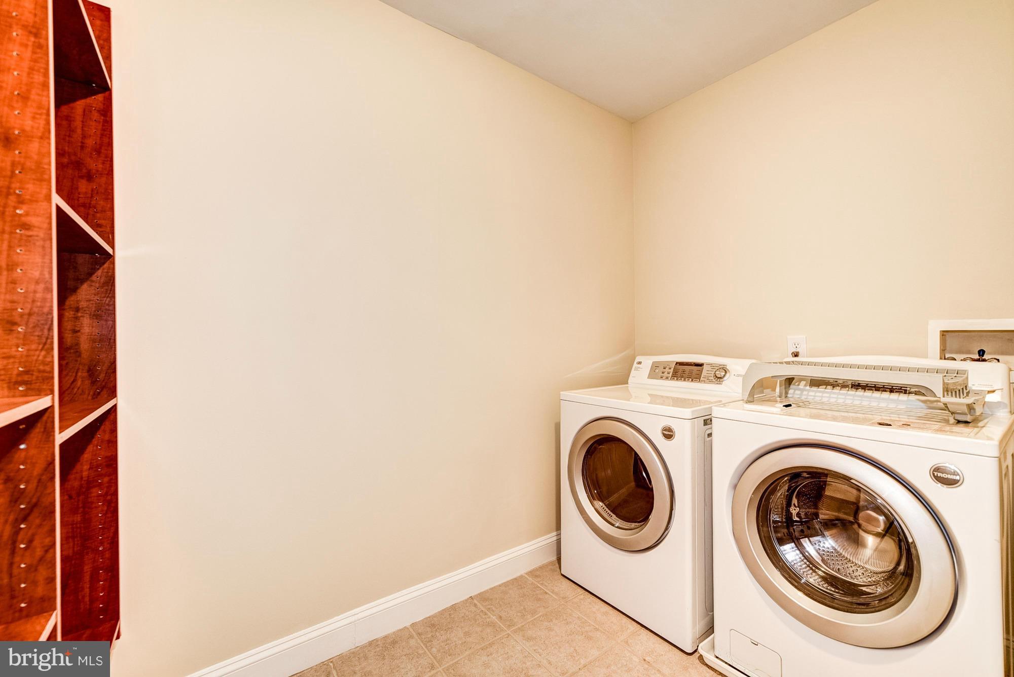 19135 Mateny Hill Road Germantown, MD 20874 - Photo 22 of 30 Upper Level Laundry with built-in shelves