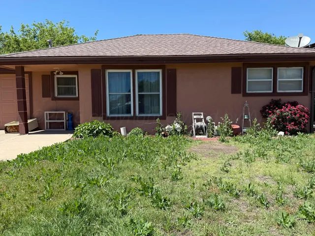 a front view of house with yard