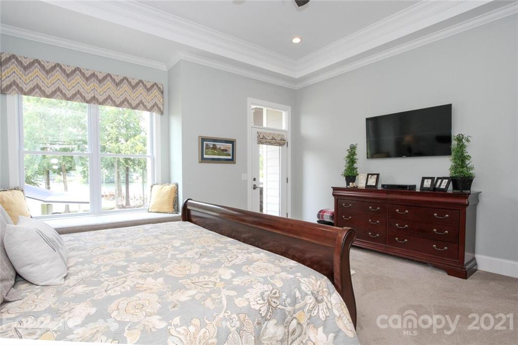 447 Bethel Church Road Prosperity, SC 29127 - Photo 22 of 34 a bedroom with a bed and a flat screen television