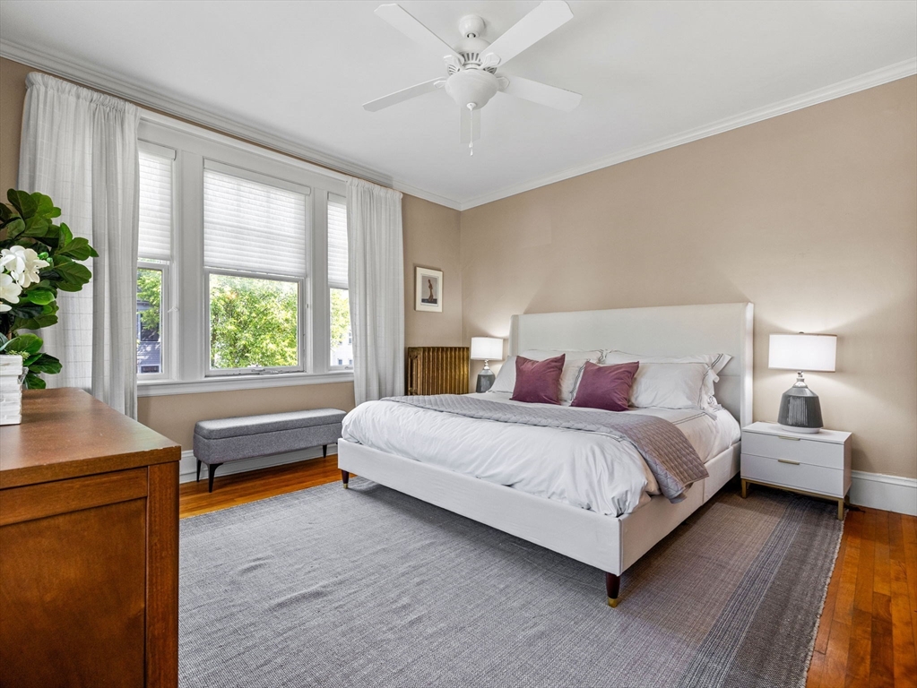 82 Perkins Street Boston, MA 02130 - Photo 13 of 31 a bedroom with a large bed and a window