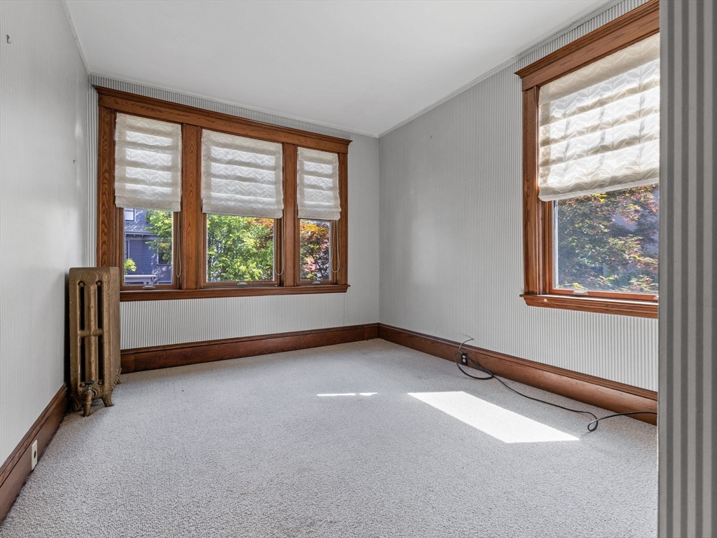 82 Perkins Street Boston, MA 02130 - Photo 17 of 31 an empty room with windows