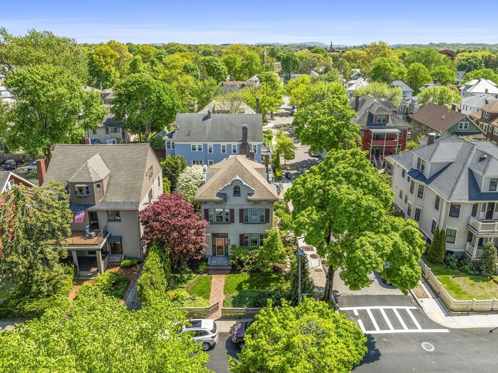 82 Perkins Street Boston, MA 02130 - Photo 21 of 31 an aerial view of a house with a yard basket ball court and outdoor seating