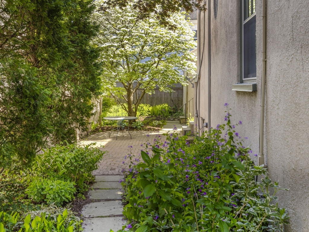 82 Perkins Street Boston, MA 02130 - Photo 27 of 31 a view of a pathway both side of a house