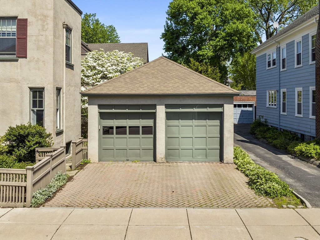 82 Perkins Street Boston, MA 02130 - Photo 29 of 31 a front view of a house with garden