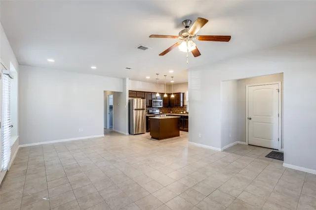 a view of a kitchen with a sink