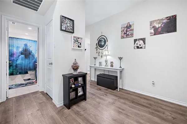 workspace with wooden floor and window