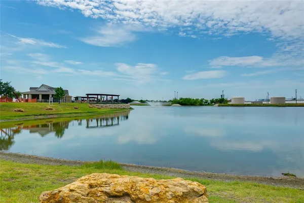 a view of a lake with a nearby beach