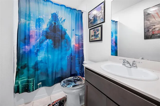 a bathroom with a sink and toilet