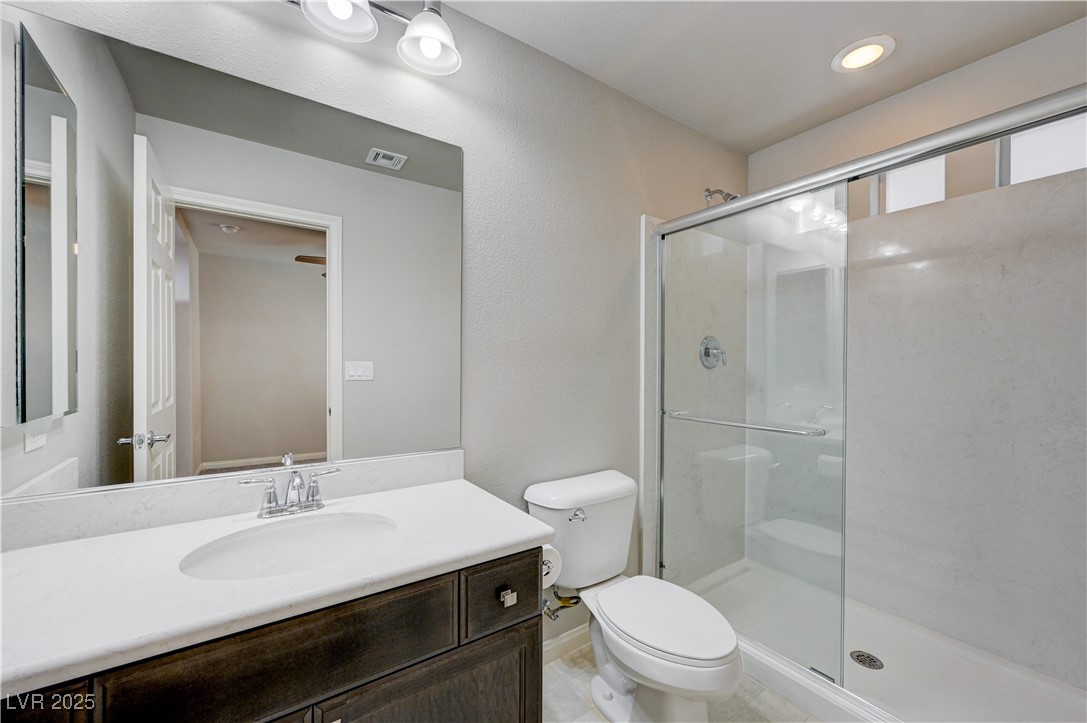 5697 Graystone Ridge Avenue Las Vegas, NV 89141 - Photo 18 of 60 En suite to bedroom 4
