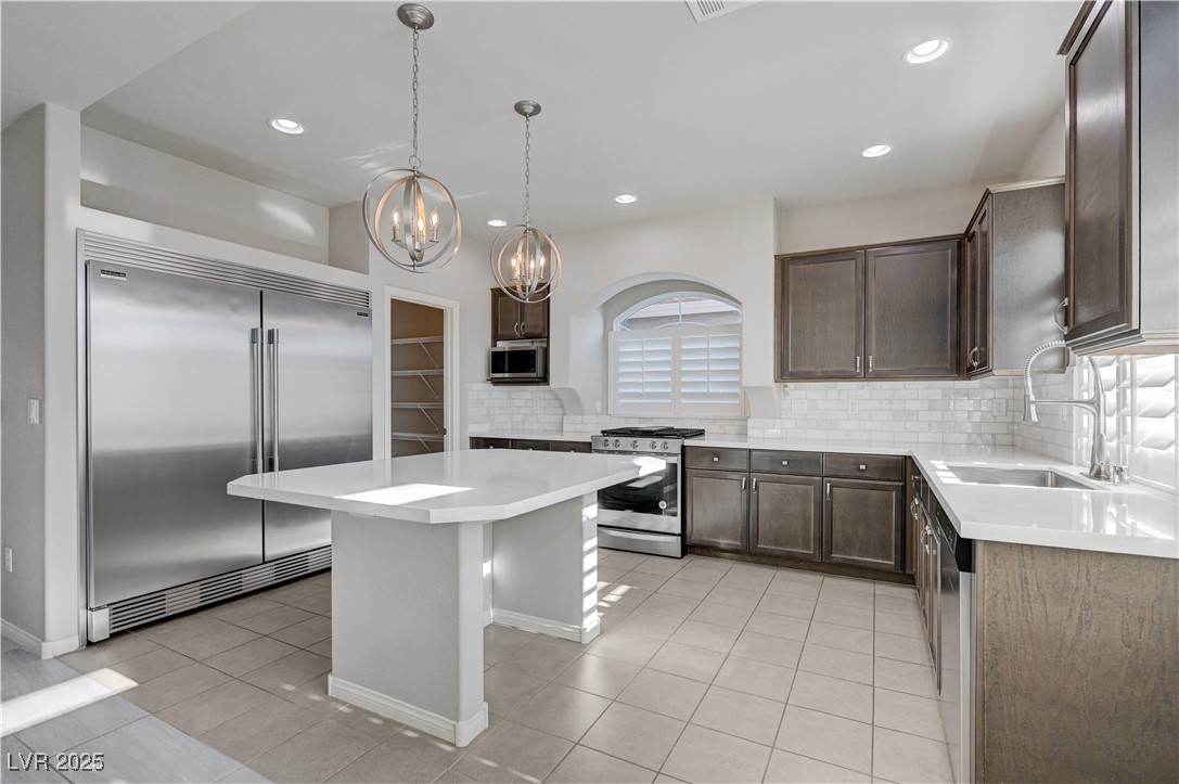 5697 Graystone Ridge Avenue Las Vegas, NV 89141 - Photo 33 of 60 Large Island, Frigidaire Professional series