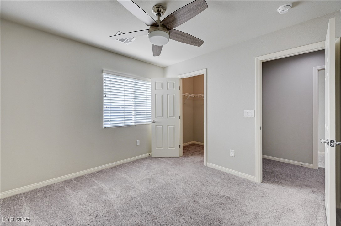 5697 Graystone Ridge Avenue Las Vegas, NV 89141 - Photo 39 of 60 upstairs bedroom 2 with walkin closet