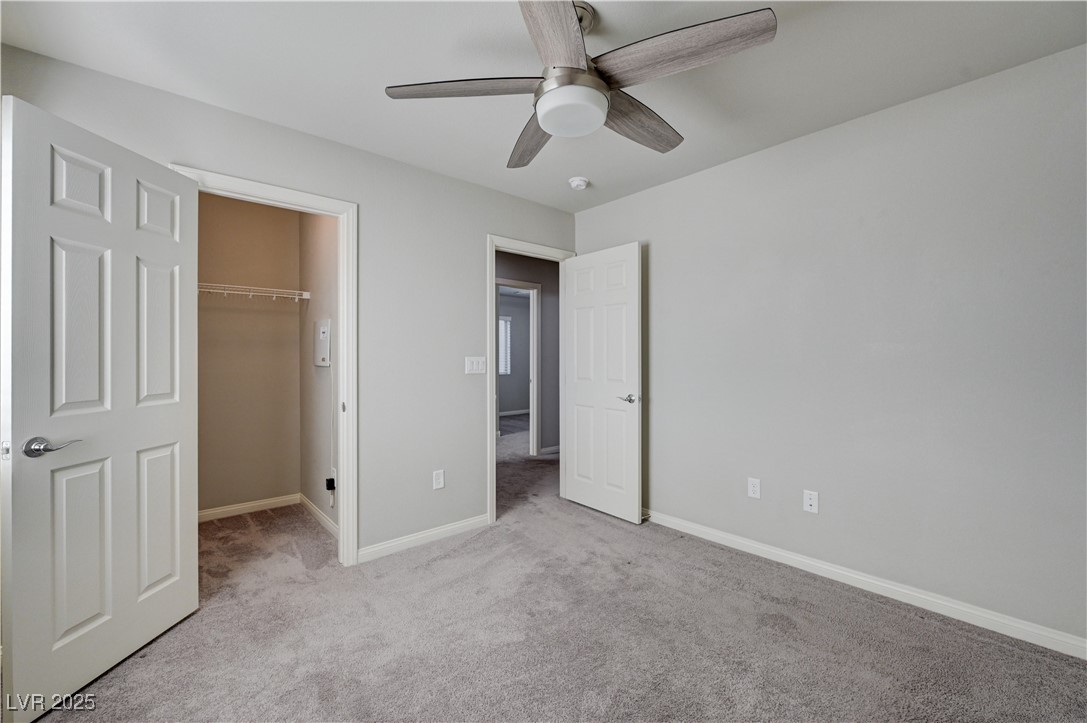 5697 Graystone Ridge Avenue Las Vegas, NV 89141 - Photo 40 of 60 upstairs Bedroom 2 with walk-in closet