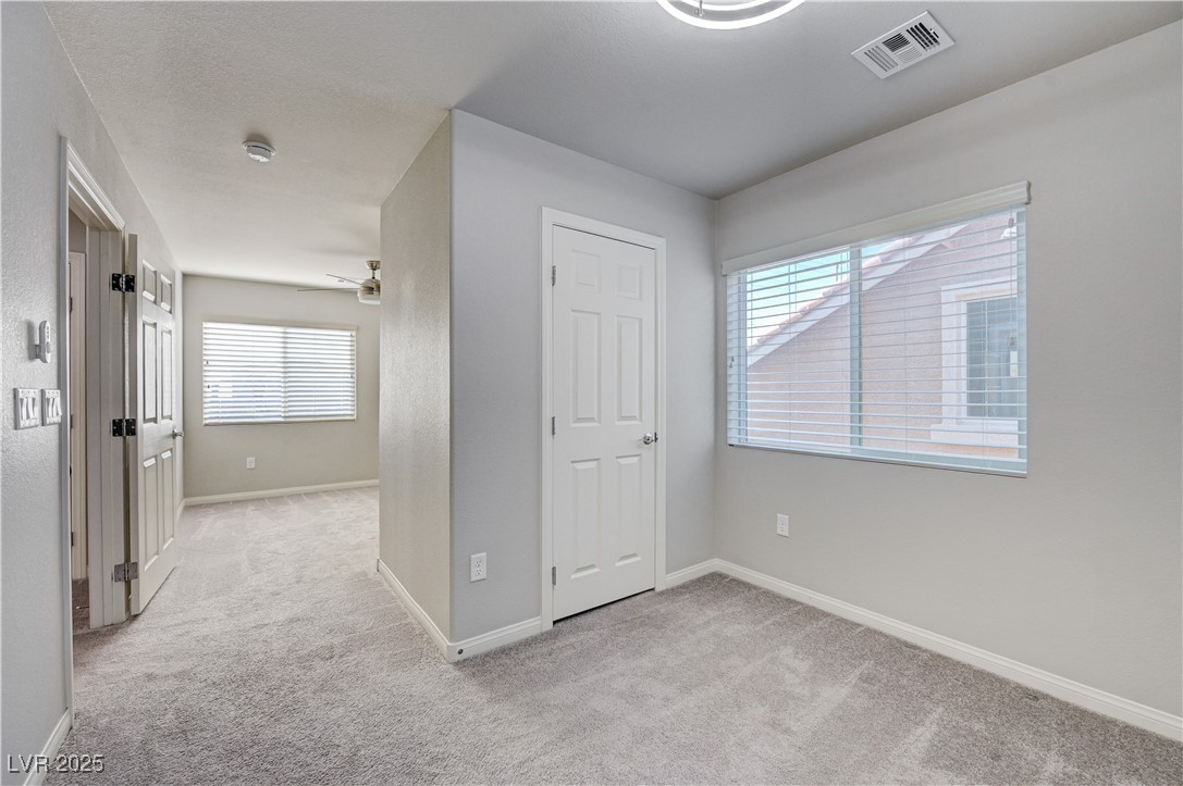 5697 Graystone Ridge Avenue Las Vegas, NV 89141 - Photo 41 of 60 Bedroom 3 with walk in closet and separate den