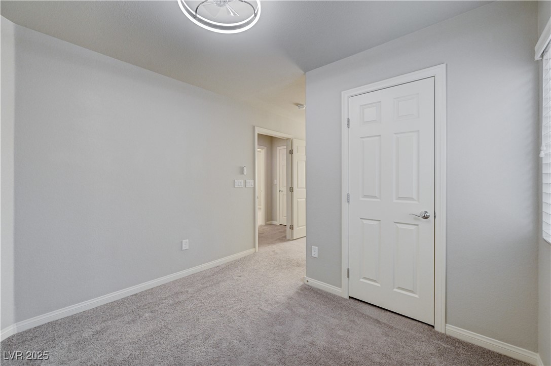 5697 Graystone Ridge Avenue Las Vegas, NV 89141 - Photo 42 of 60 Bedroom 3 with walk in closet and separate den
