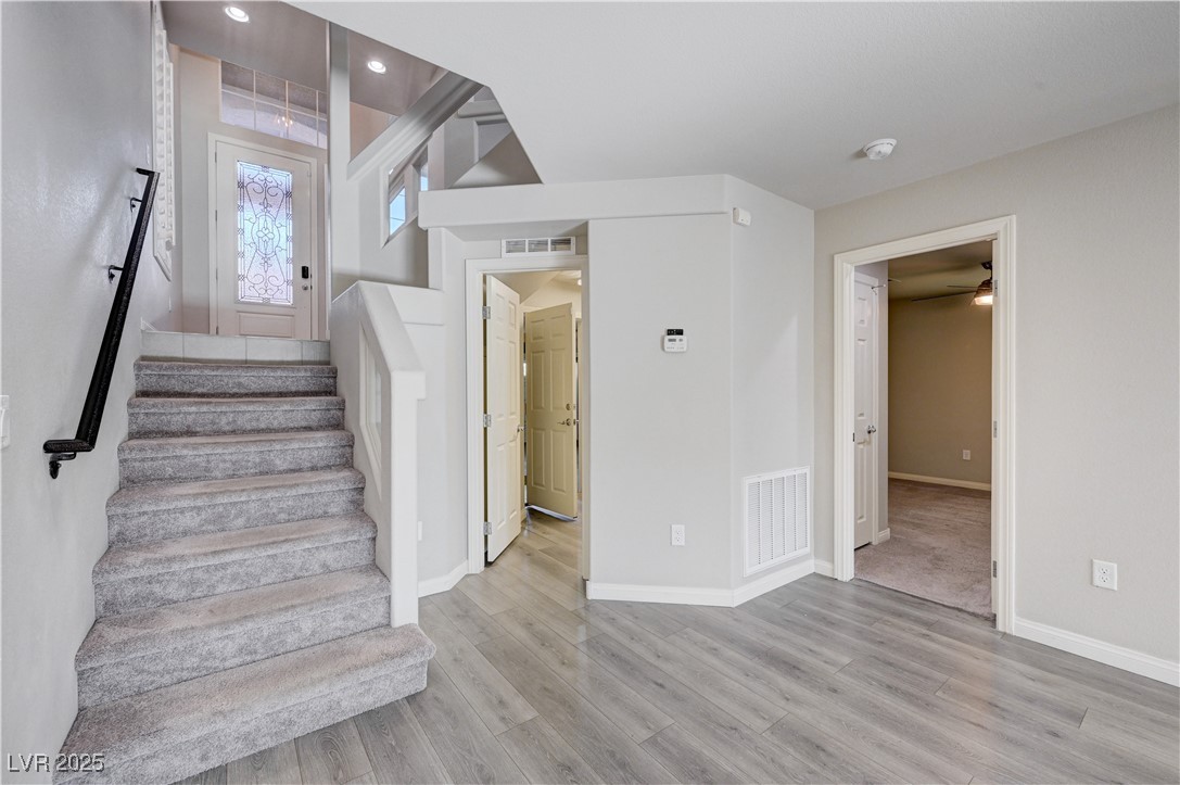 5697 Graystone Ridge Avenue Las Vegas, NV 89141 - Photo 45 of 60 1st level looking towards garage/laudry room AND 4th bedroom