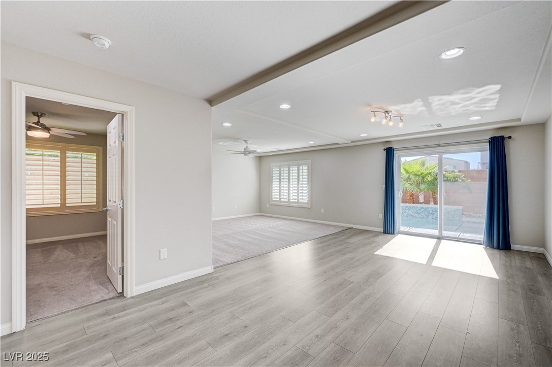 5697 Graystone Ridge Avenue Las Vegas, NV 89141 - Photo 46 of 60 1st level family room and bedroom 4