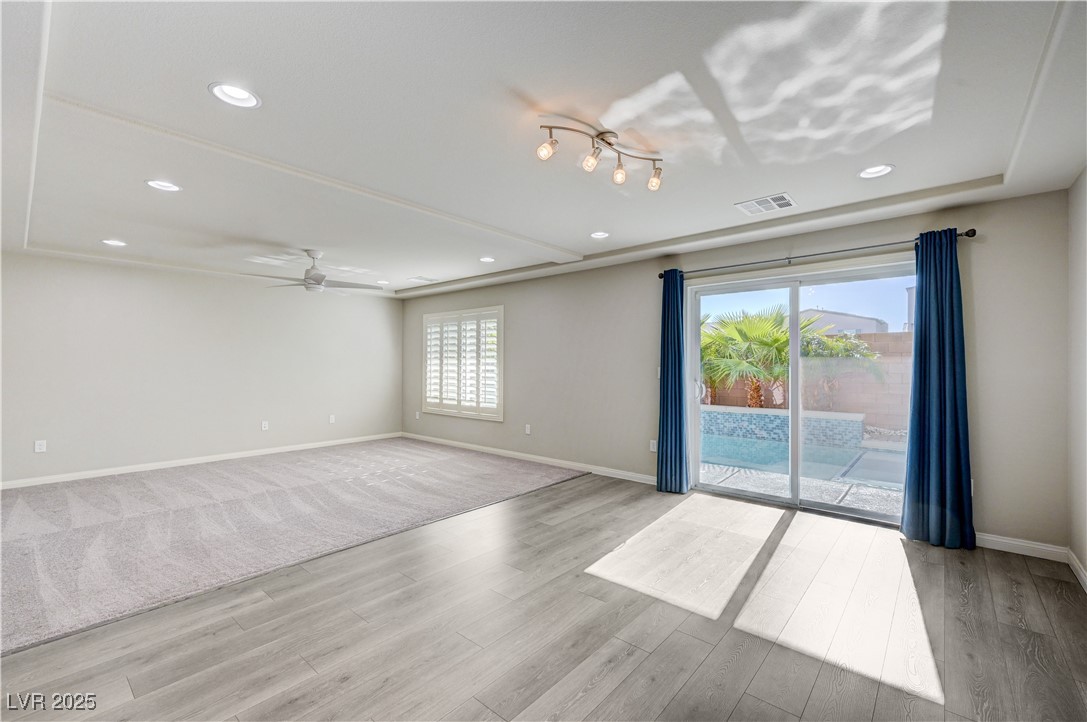 5697 Graystone Ridge Avenue Las Vegas, NV 89141 - Photo 47 of 60 1st level family room with direct access to backyard and pool.