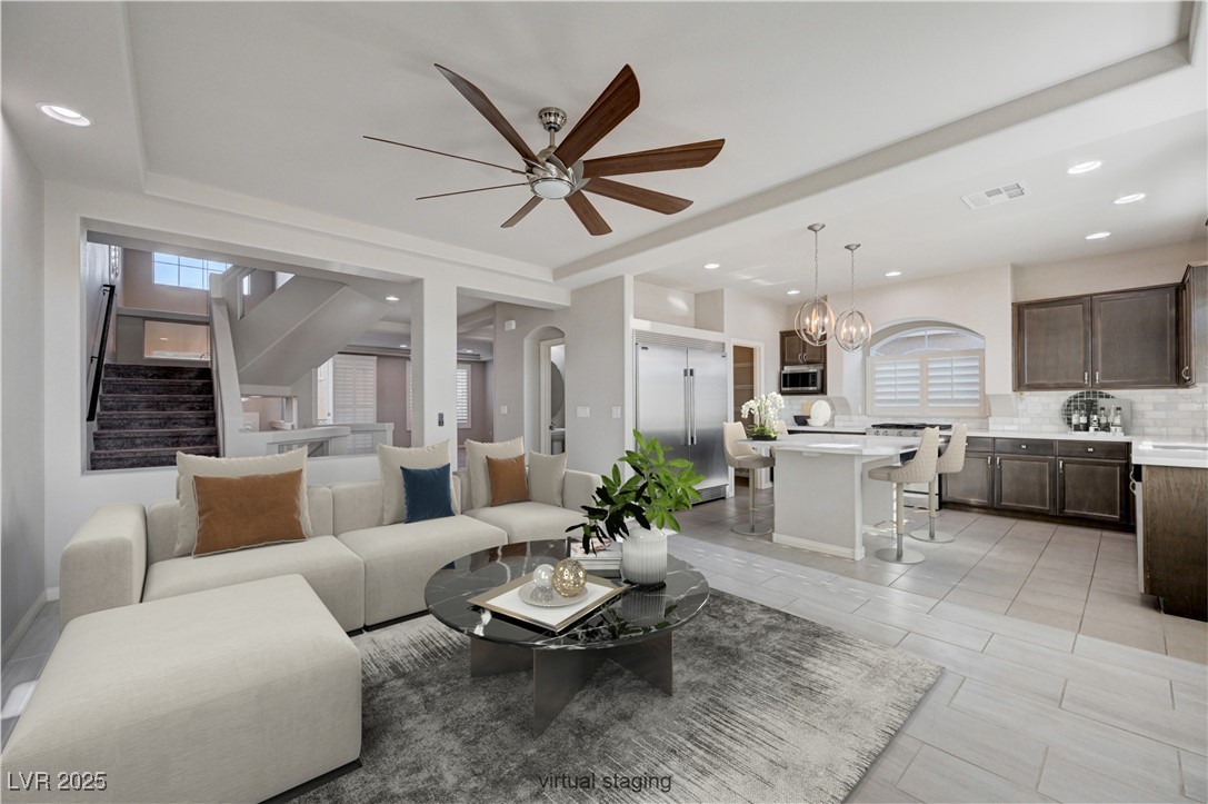 5697 Graystone Ridge Avenue Las Vegas, NV 89141 - Photo 9 of 60 Family room/eat in kitchen area, virtually staged