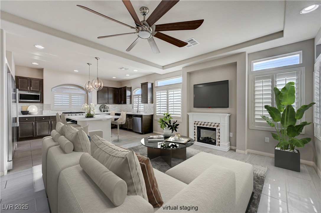 5697 Graystone Ridge Avenue Las Vegas, NV 89141 - Photo 10 of 60 Family room/eat in kitchen area, virtually staged