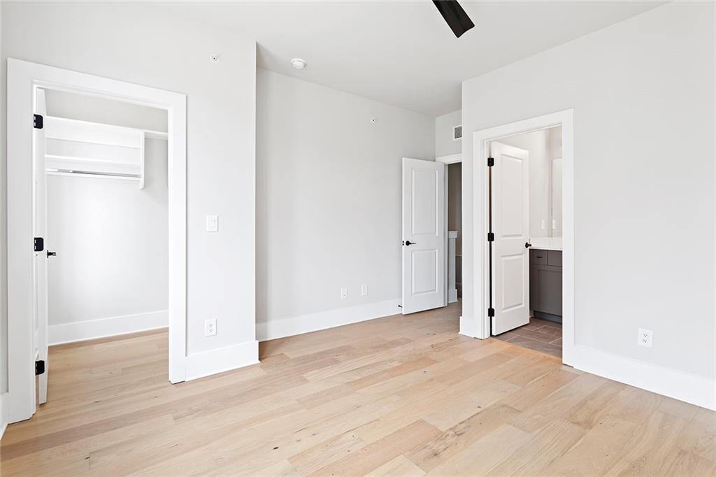 7150 Summit Place Alpharetta, GA 30009 - Photo 12 of 33 a view of an empty room with wooden floor