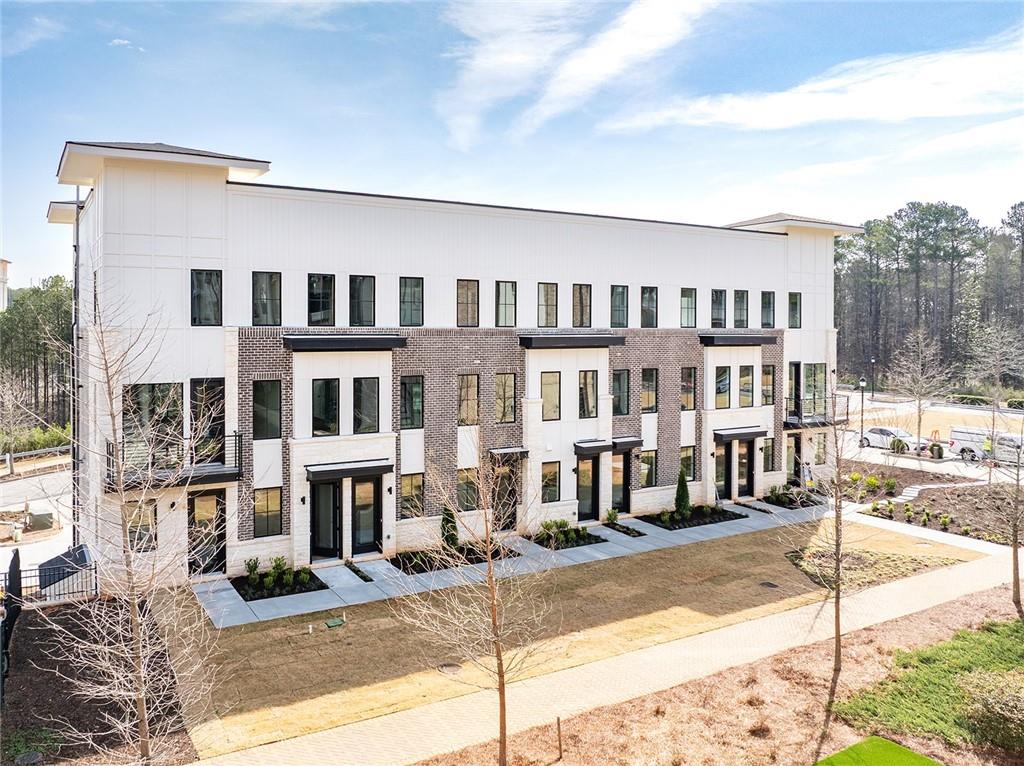 7150 Summit Place Alpharetta, GA 30009 - Photo 19 of 33 a front view of a building with street view