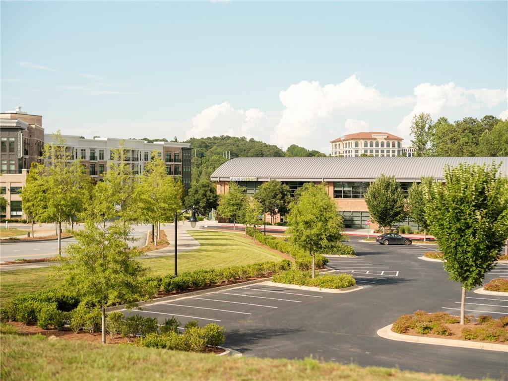 7150 Summit Place Alpharetta, GA 30009 - Photo 29 of 33 a view of a swimming pool with an outdoor seating