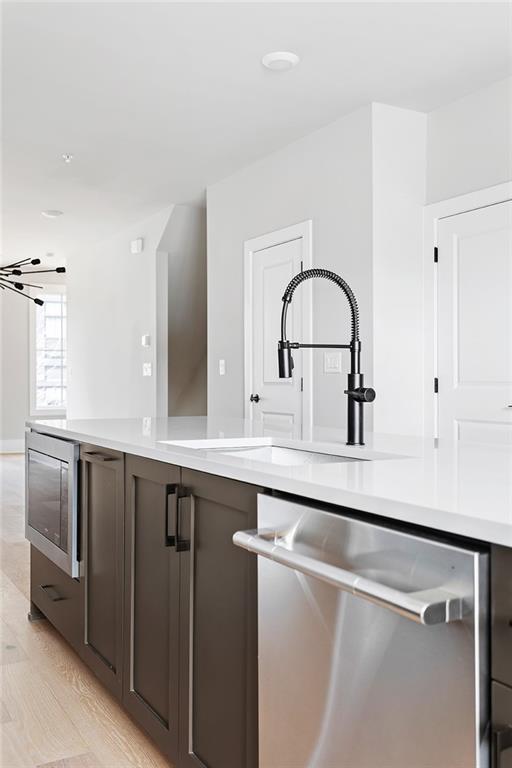 7150 Summit Place Alpharetta, GA 30009 - Photo 7 of 33 a close view of sink and tap