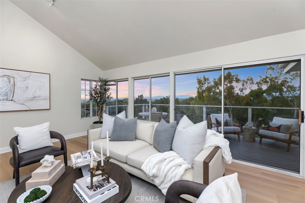 22 Delphinus Irvine, CA 92603 - Photo 16 of 42 a living room with furniture and a large window