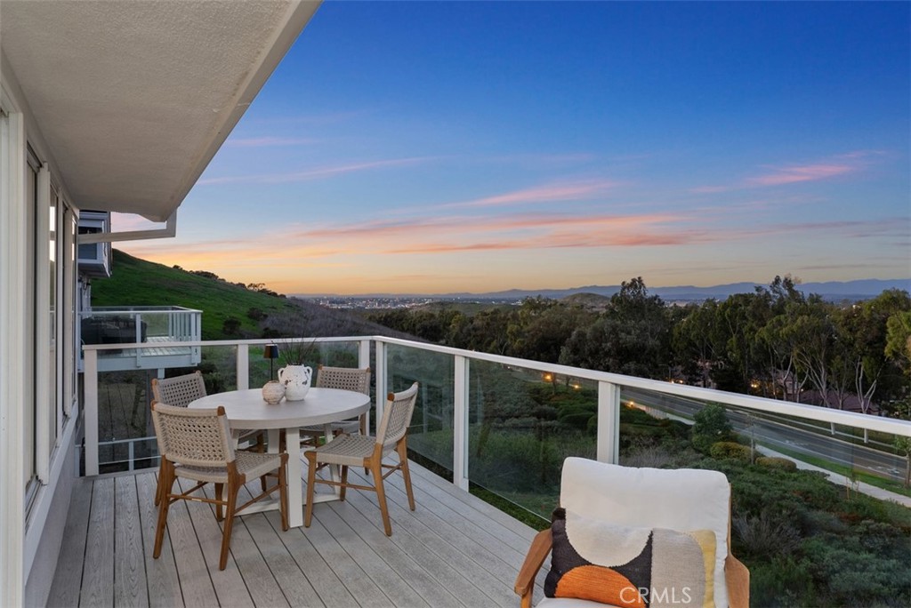 22 Delphinus Irvine, CA 92603 - Photo 17 of 42 a view of a chairs and table on the balcony