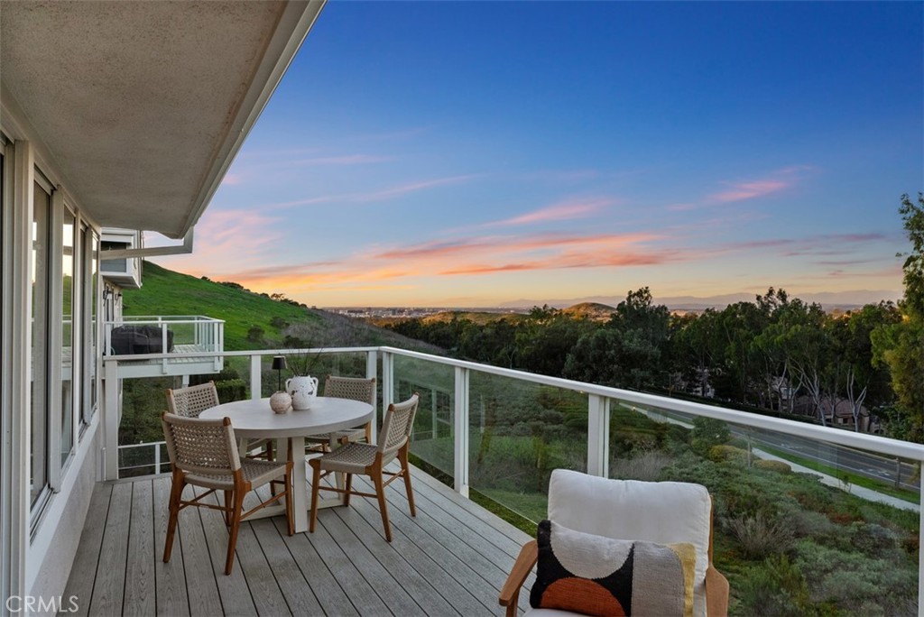 22 Delphinus Irvine, CA 92603 - Photo 2 of 42 a view of a chairs and table on the deck