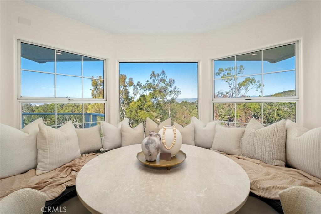 22 Delphinus Irvine, CA 92603 - Photo 27 of 42 a living room with furniture and a large window