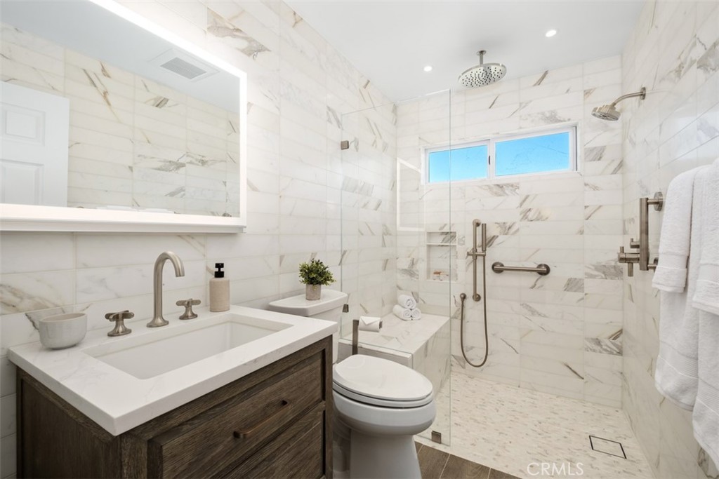 22 Delphinus Irvine, CA 92603 - Photo 32 of 42 a bathroom with a sink toilet and shower