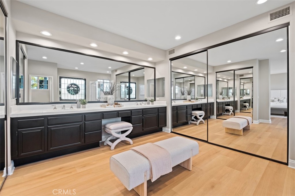 22 Delphinus Irvine, CA 92603 - Photo 35 of 42 a living room with granite countertop furniture a rug kitchen view and large windows