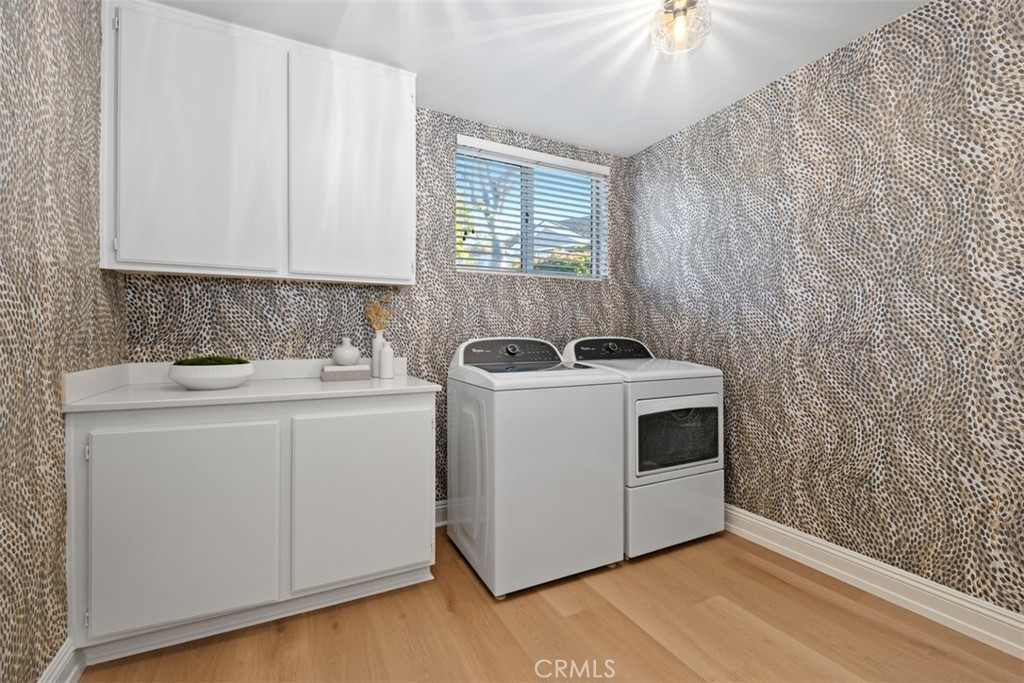 22 Delphinus Irvine, CA 92603 - Photo 39 of 42 a utility room with dryer and washer