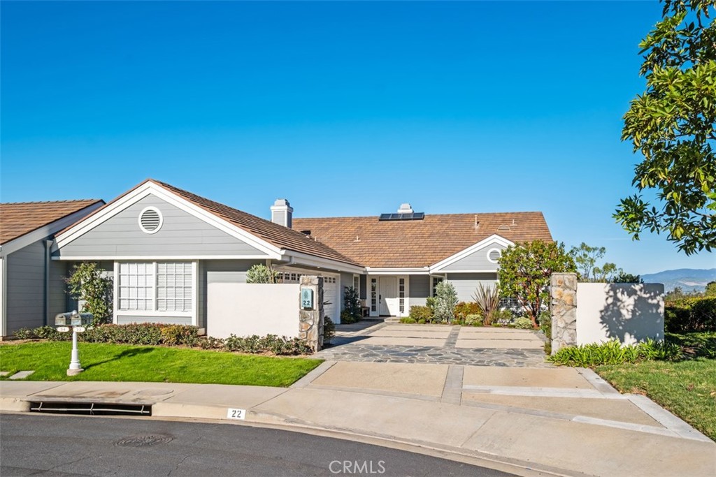 22 Delphinus Irvine, CA 92603 - Photo 42 of 42 a front view of a house with a yard