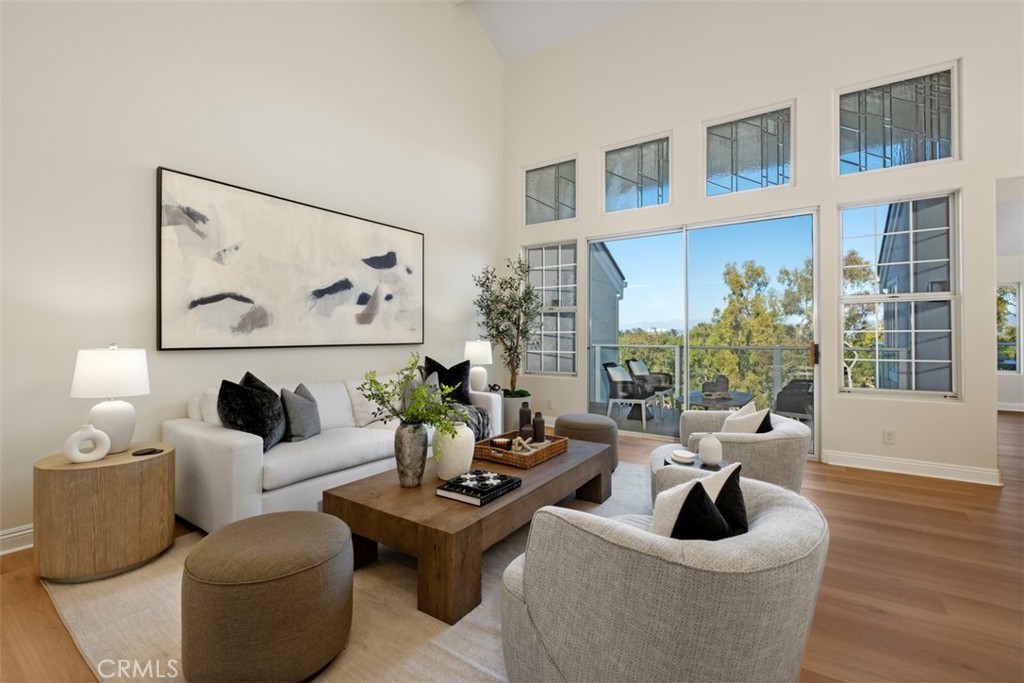 22 Delphinus Irvine, CA 92603 - Photo 8 of 42 a living room with furniture and a large window