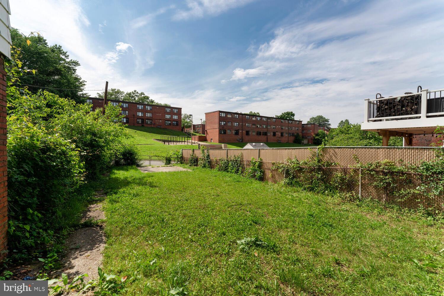 212 Division Avenue Northeast Washington, DC 20019 - Photo 15 of 21 a view of backyard with seating area and green space