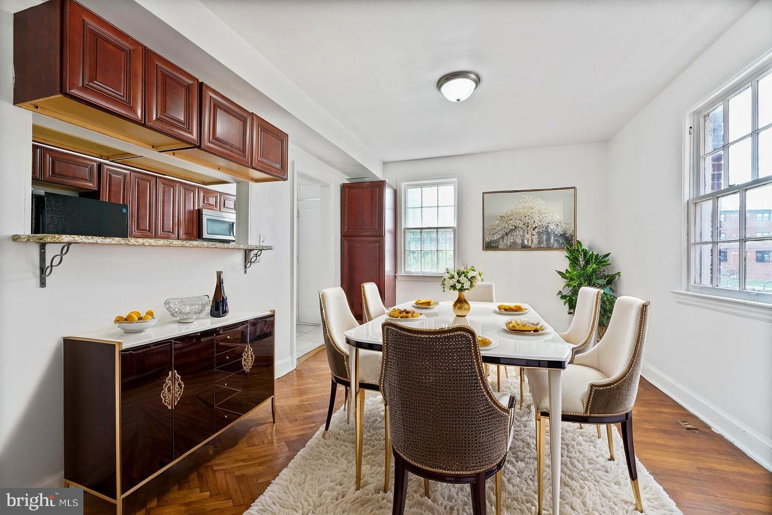 212 Division Avenue Northeast Washington, DC 20019 - Photo 3 of 21 a view of a dining room with furniture and window
