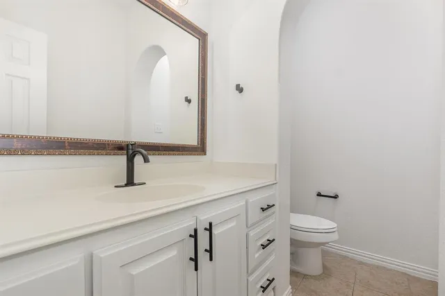a close view of a sink and a toilet