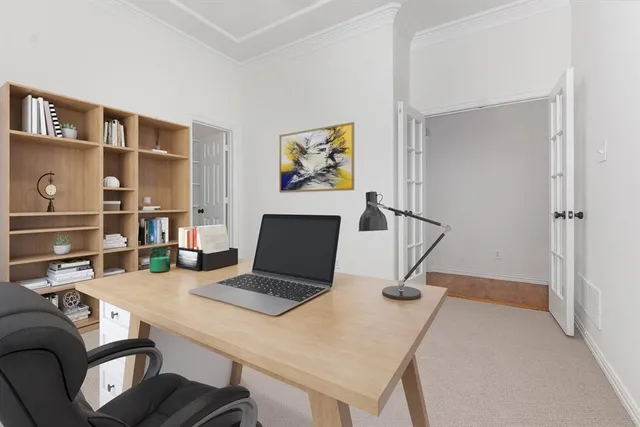 a view of a workspace with furniture