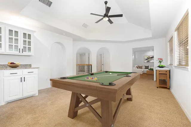 a view of a livingroom with furniture and window